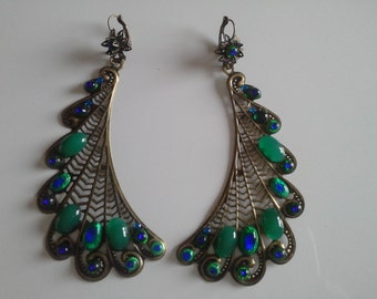 long dangle earrings: the Peacock