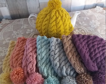 Vintage style inspired hand cable knitted tea cosy / cozy in luscious colours, with of a pompom on top! perfect afternoon tea accessory!