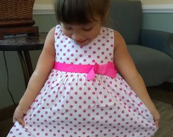 Girl's size 3 T or 4 T pink and white polka dotted Dress one of each size