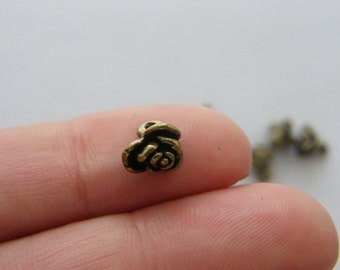 12 Rose charms antique bronze tone BC165