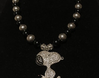 Black and silver beaded necklace with large dog embellished pendant