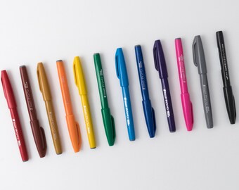 Pentel Sign Pen with firm brush tip for writing, drawing, and calligraphy