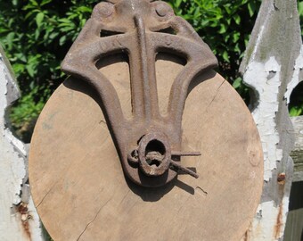 Vintage Cast Iron And Wood Pulley.