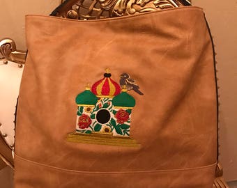 Beatiful embroidered studded handbag