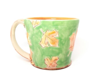 Green maple leaf Earthenware mug. Wheel thrown, food safe leafy mug made by Kaitlyn Brennan / Brennan Pottery