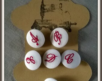 Button with embroidered Monogram