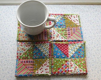 vintage fabric blue green and red hand quilted set of mug rugs coasters