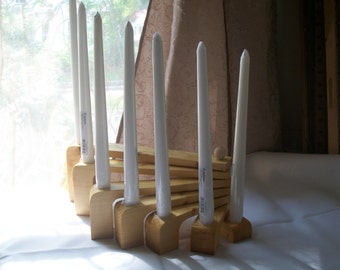 Folding candle holder