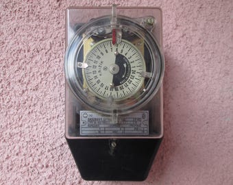 Electrical switch, Switch for electric meter, Switch day and night rate, Еlectrical tool, Vintage timer for power on / off / Power switch