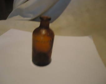 Vintage Brown Glass Bottle 60 Mils, collectable