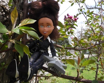 Bare Faced Dolls # 65 - Black hair- Grey eyes - Pictured In Tree - Ooak - Repainted- Bratz Makeunder- Changed doll.