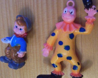 two plastic vintage toy figurines