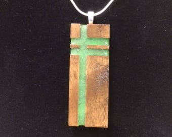 resin and wood pendant with silver necklace, glows in the dark