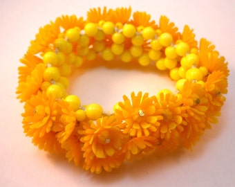 School bus yellow kitschy plastic flower bracelet