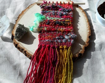 Small Weaving with Hand Spun Wool, Silk, Mohair, Sparkle in reds with gold & green tones