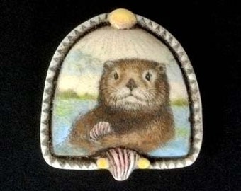 Sea Otter with shell scrimshaw technique reproduction pin