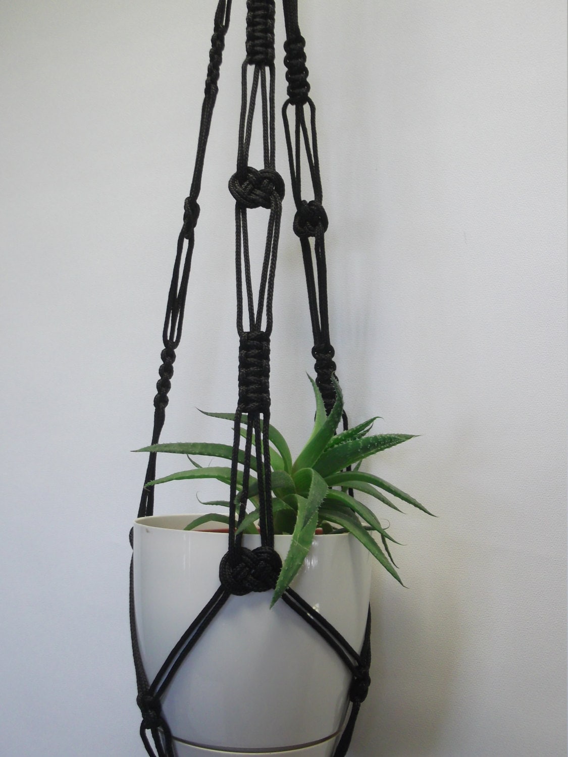 Black hanging planter. Macrame plant hanger. Hanging flowerpot