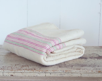 Hand Woven Blanket in a White Cream Color With Green and Pink Stripes