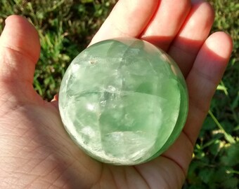 Palm sized fluorite sphere