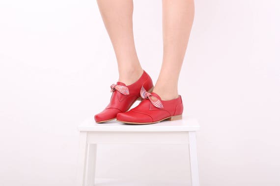 red flat leather shoes