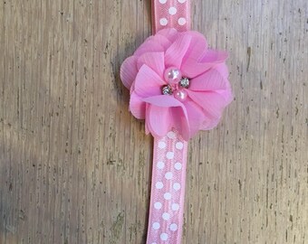 Baby headband pink with white dots with flower in pink