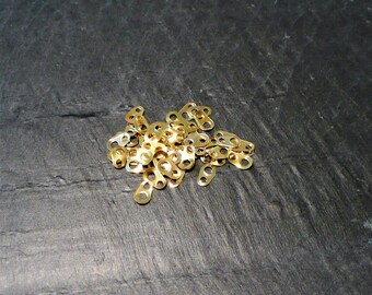 Set of 550 small connectors with 2 holes 6.5 mm