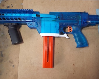 Nerf Worker Prophecy Forward shifted Katana magazine adapter with extended mag release mod.