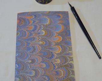 Blue, gold, orange and cream hand marbled paper hand sewn notebook