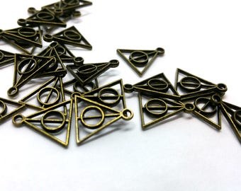 x1 Breloque Relique de la Mort - 13 x 12 mm - Harry Potter - Métal coloris bronze
