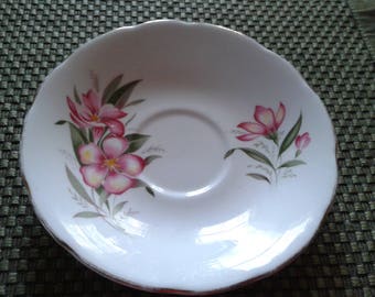Group of 4 imported vintage tea cup saucers