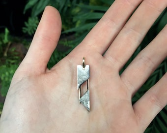 sliced meteorite welded with 14 karat gold pendant