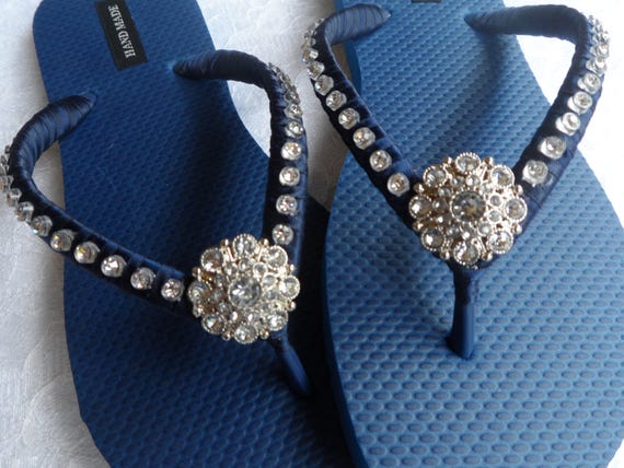 navy blue flip flops with bling