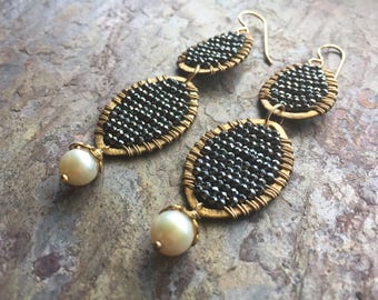 Gold hoop statement earrings with hematite gemstones and freshwater pearls