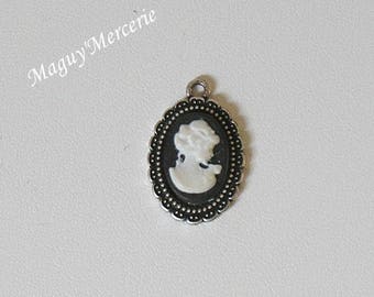 Silver cabochon grown old, and resin cameo Locket pendant