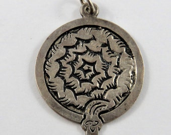 Snake or Serpent Curled Up in a Circle Sterling Silver Charm or Pendant.