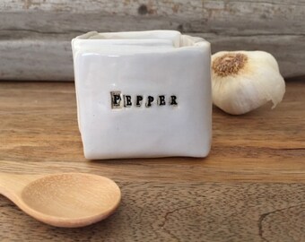 PEPPER cellar with spoon