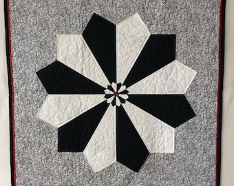 Bold black and white quilted wall art