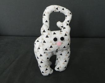 white kitten with geometric pattern