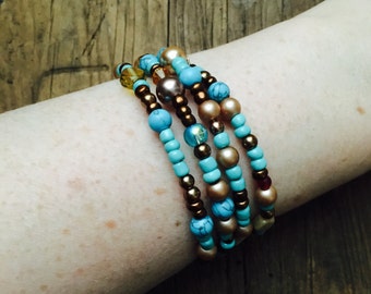 Memory wire bracelet with glass beads, Swarovski crystals, green blue, pyrite