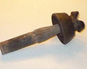 Ceramic Insulator on Wooden Peg