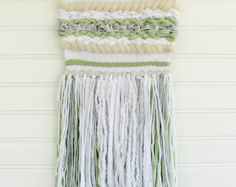 Green woven wall hanging