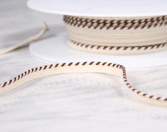 4.5 m of 6mm, cotton tape, broken and Brown, white (4581)