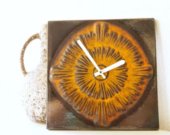 Large Mid Century ceramic wall clock, Kienzle, Germany.