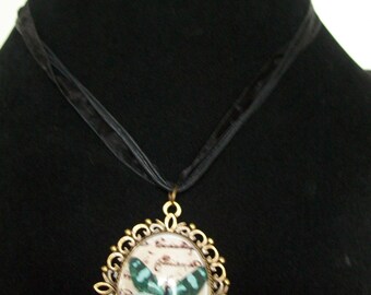 Butterfly glass cabochon necklace