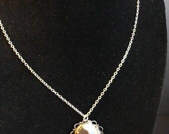 Opal in antique silver pendant necklace