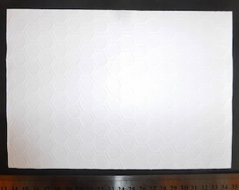 Background of embossed white card/page honeycombs 21x29.7cm 210g