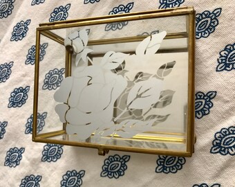 Vintage glass and brass jewelry box.