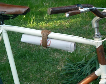 Bicycle multiuse holder, lock umbrella...