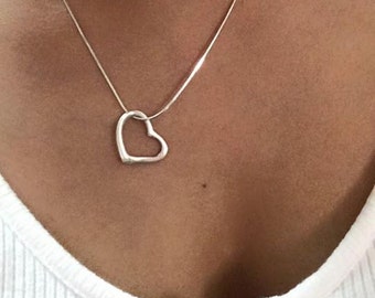 FLOATING HEART PENDANT on Silver Chain