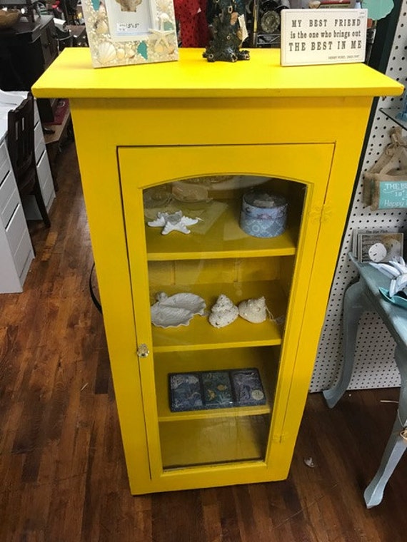 Yellow display cabinet